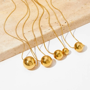Minimalist gold plated hollow ball pendant necklace with sleek mirror finish snake chain