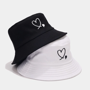 Minimalist cotton bucket hats in black and white featuring heart embroidery for sun protection