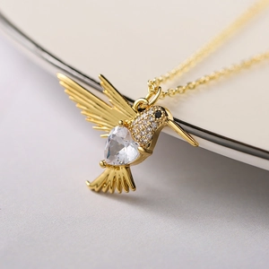 18K gold plated hummingbird necklace with heart shaped zircon and shimmering crystals