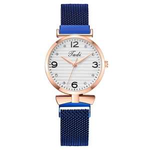 Fashionable women's quartz watch with rose gold case and blue magnetic mesh band