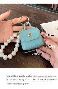 Mini light blue crocodile textured leather coin purse with pearls and gold keychain