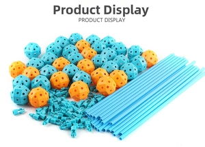 Macro shot of blue support rods and orange spherical connectors for DIY castle tent kit
