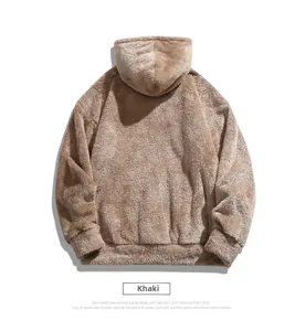 Detail of khaki fleece hoodie showing soft sherpa texture and ribbed cuffs