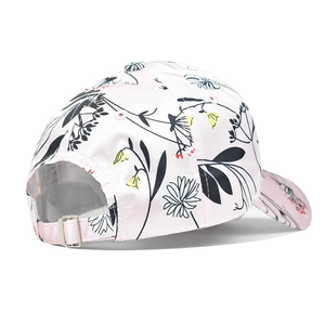 Rear view of floral print baseball cap featuring pink satin fabric and silver metal buckle