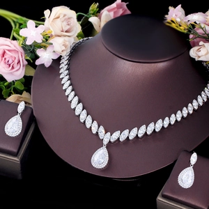 Macro detail of bridal jewelry set with marquise and teardrop cubic zirconia
