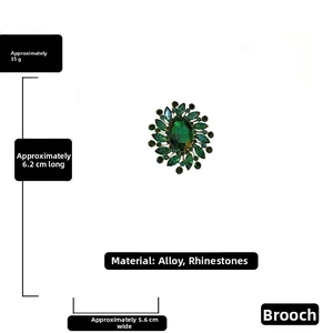 Detailed view of emerald crystal flower brooch with dimensions 6.2cm and 35g weight