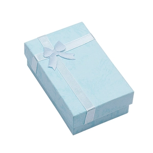 Sky blue rectangular jewelry gift box with a white ribbon bow and textured paper finish