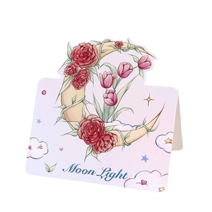 Floral Moon Light greeting card featuring red roses and pink tulips on white background