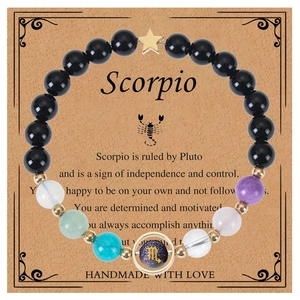Detail of Scorpio zodiac bracelet with blue sandstone and colorful natural crystal beads