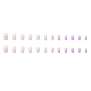 Short square press-on nails featuring lavender floral patterns and purple plaid designs