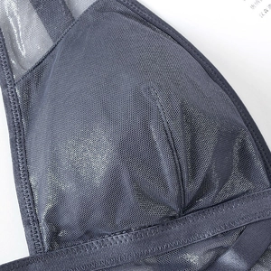 Dark grey breathable mesh bra top featuring reinforced zigzag stitching and sheer texture