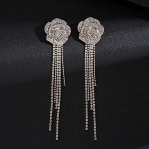 Elegant silver flower earrings with long shimmering rhinestone tassels and crystal inlay