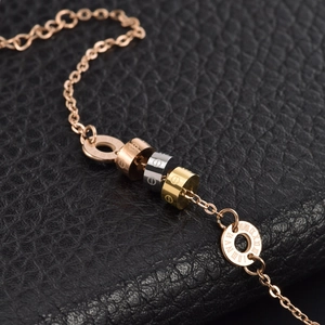 Three-tone titanium steel lucky charm bracelet with Roman numerals on black leather