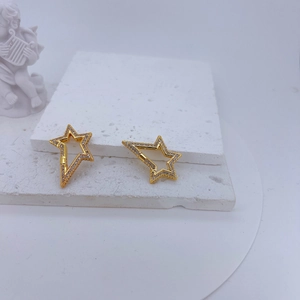 Detail of 14K gold plated star-shaped charms with cubic zirconia for DIY jewelry