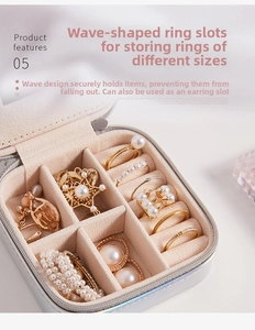 Detail of jewelry organizer with wave ring slots and beige velvet lining for storage