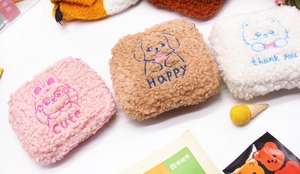 Detailed plush cartoon sanitary pad organizers with cute animal embroidery in three colors