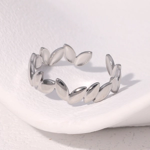 Minimalist silver stainless steel open leaf ring with polished metallic finish for women