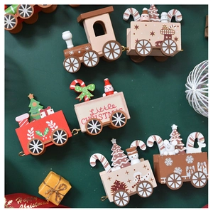 Detailed top view of wooden Christmas train with mini snowman and festive tree decor