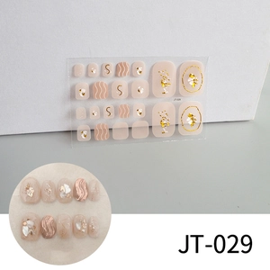 Detail view of JT-029 gold foil and white shell texture 3D nail art stickers for toes