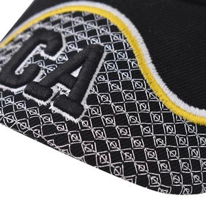 Macro detail of high-quality CA embroidery on black twill baseball cap fabric