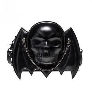 Gothic skull shoulder bag featuring 3D bat wings and silver metal chain detail