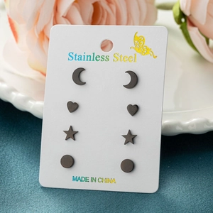 Set of 4 pairs of black stainless steel stud earrings in heart, moon, star and disc shapes