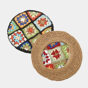 Handmade crochet floral beret hat with colorful granny square pattern for beach vacations