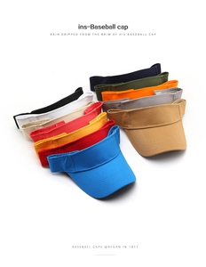 Flat lay of colorful cotton sun visors showing a variety of ten solid colors for summer