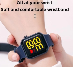 Detail of blue silicone strap and square LED watch face with yellow digital display