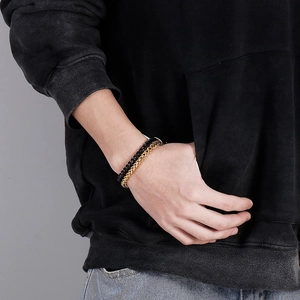 Men's minimalist double-layer woven chain bracelet in black and gold titanium steel