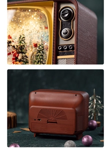 Detail view of vintage TV Christmas box showing the wood grain finish and control switch