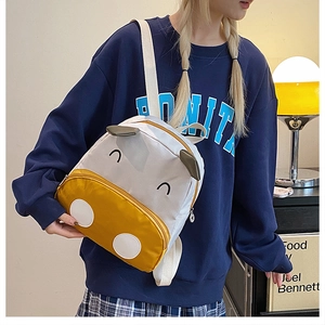 Cute cow shaped canvas backpack for toddlers with cartoon ears and polka dots