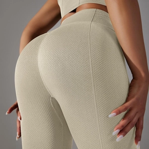 Macro detail of seamless 3D honeycomb textured high waist yoga leggings with V-butt contour