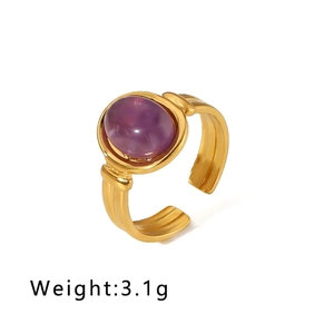 Detail of adjustable gold stainless steel ring with a 13mm oval purple natural stone