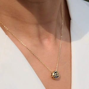 Gold hollow spherical zodiac pendant necklace with sparkling colorful birthstone details