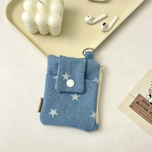 Blue denim card holder with star patterns, side zipper and metal hook attachment