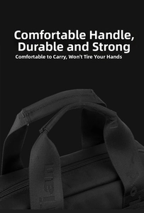 Close-up of a durable padded handle and reinforced nylon strap on a black briefcase