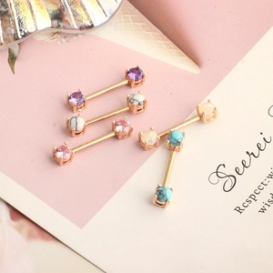Rose gold stainless steel nipple rings set with colorful zircon stones in various shades