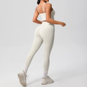 Detail of cream yoga set with thin strap sports bra and high waist seamless leggings