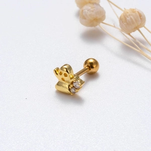 Macro shot of gold bee stud earring with sparkling crystals and screw back closure