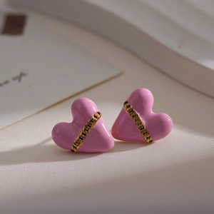 Pink heart stud earrings with golden chain detail, luxury design for women's winter style