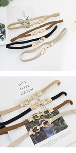 Detail view of elastic waist belts in four colors with golden horsebit buckles