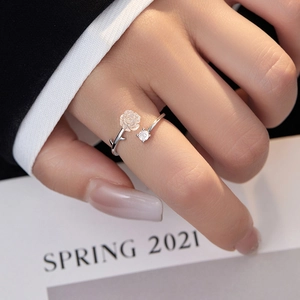 Elegant S925 silver camellia flower open ring with single diamond for women