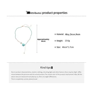 Detailed view of elegant blue flower pendant necklace with resin pearls and zircon stones
