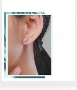 Close-up of S925 silver water drop stud earrings featuring sparkling cubic zirconia stones