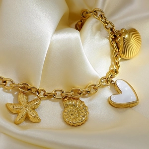 Luxury 18K gold plated stainless steel bracelet with starfish and seashell charms