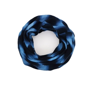 Blue and black gradient tie-dye infinity scarf with a soft knitted texture for autumn