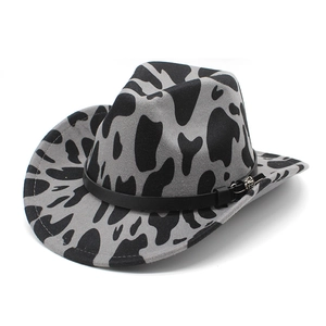 Flat brim cow print felt jazz hat with black leather band and metal skull detail