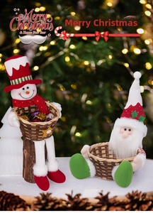 Detail of Christmas candy baskets featuring plush Santa and Snowman with woven bases