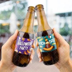 Close-up of Halloween party bottle labels with pumpkin and wizard hat illustrations